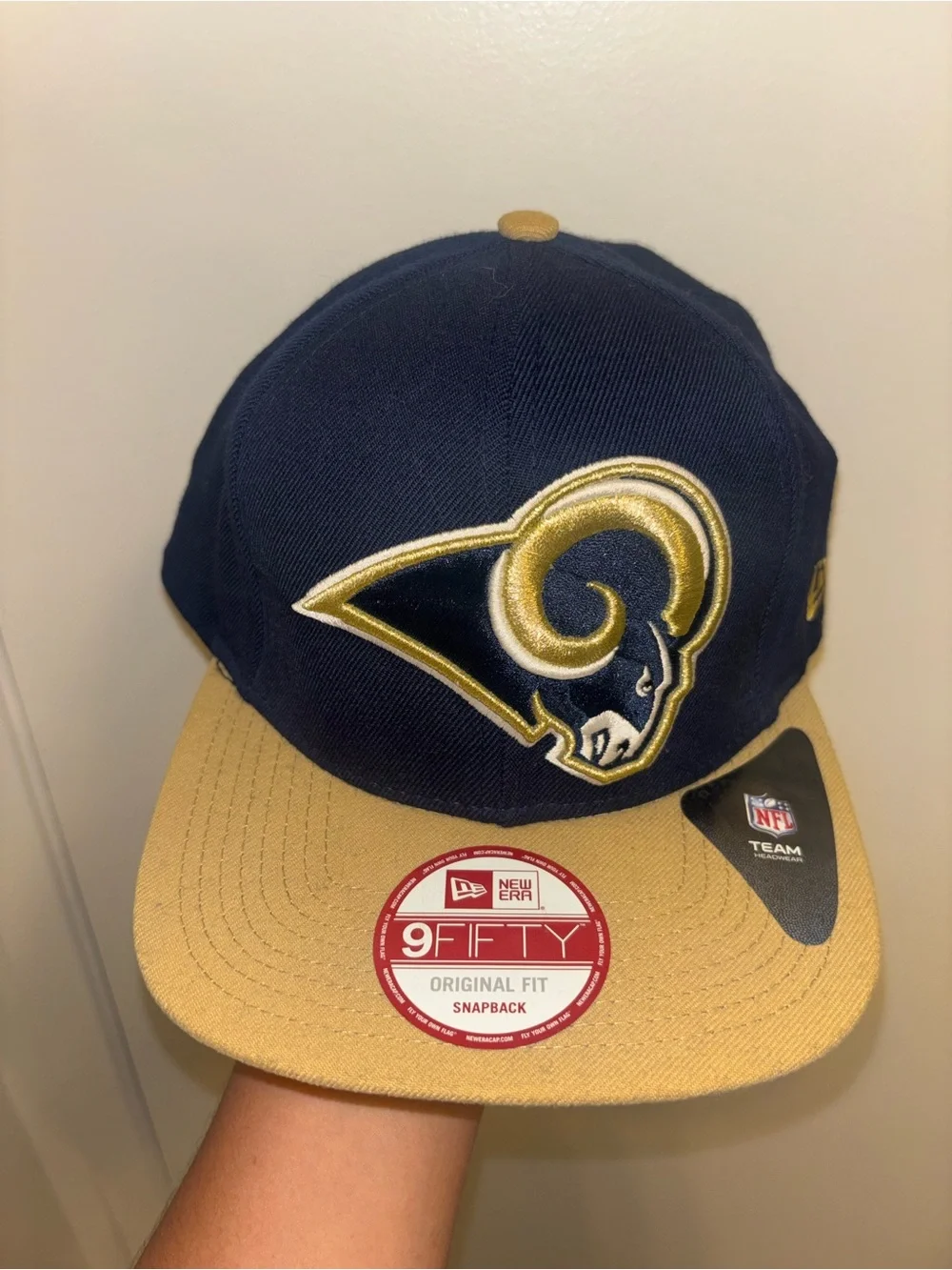 New Era Navy and Gold Rams Snapback Hat